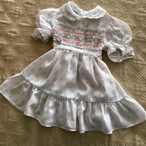 Polly Flinders hand smocked dress.